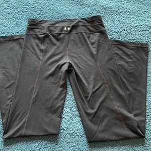 Under Armour long yoga pants, size small, black, straight leg, slight flare.